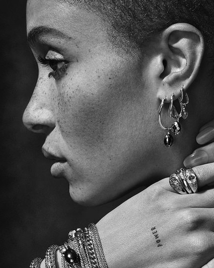 Black-and-white side portrait of Adwoa Aboah wearing John Hardy jewelry 