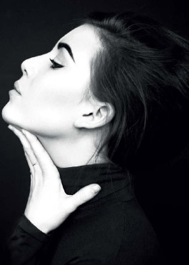 Black-and-white profile portrait of Lykke Li